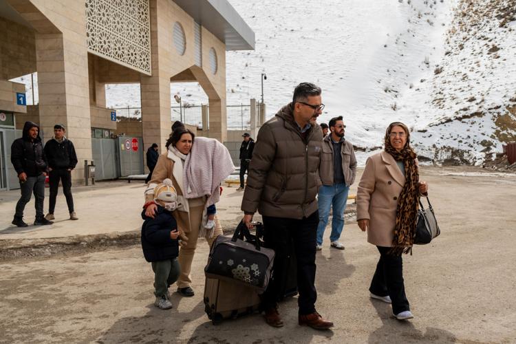 Iranians grapple with whether to flee the country because of the war