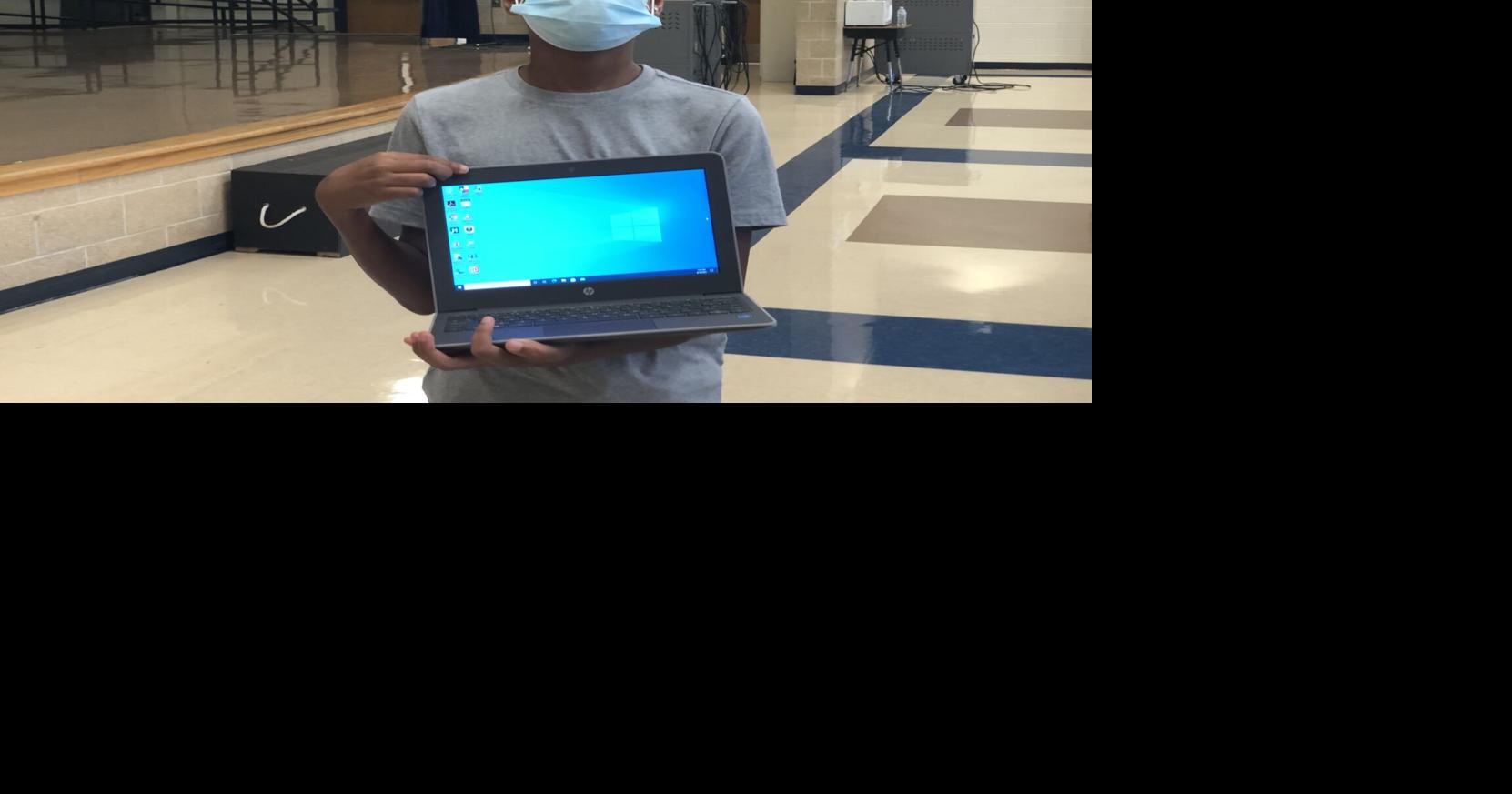 Cove Junior High students receive laptops prior to meeting teachers