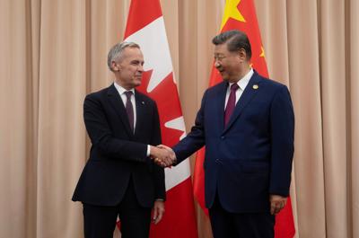 China urges Canada to break from US influence as Carney visits Beijing