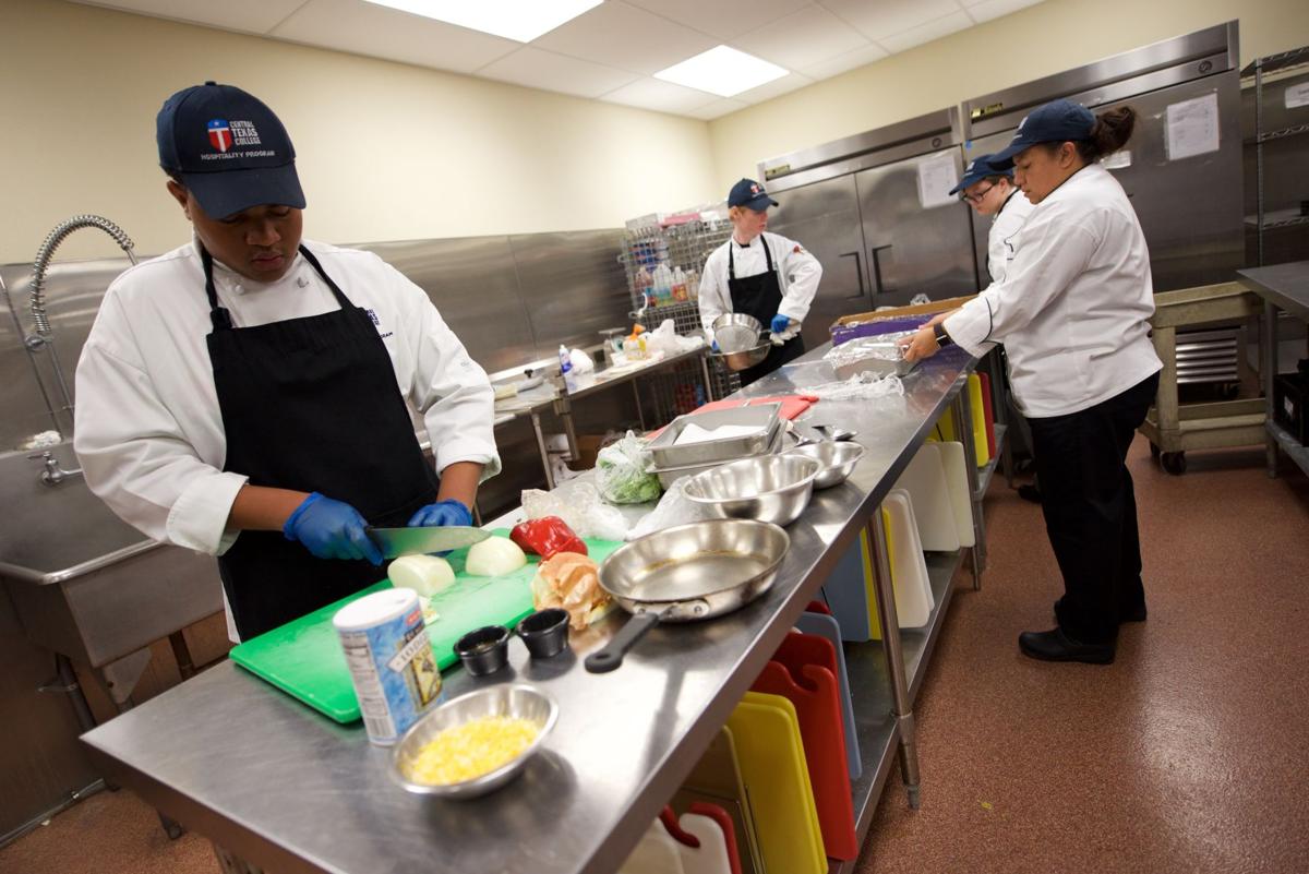 High school students cooking in the classroom | Education | kdhnews.com