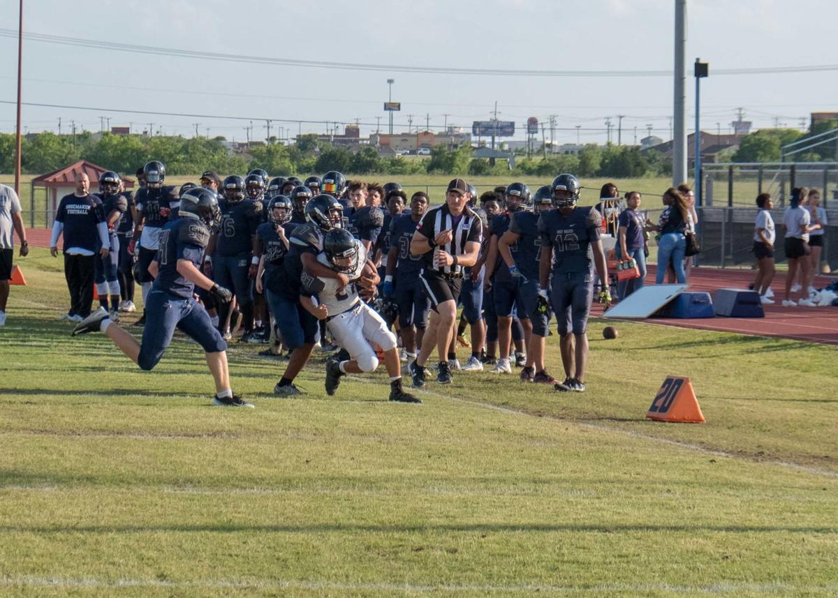 FOOTBALL White tops Blue 2114 in Shoemaker spring game Shoemaker