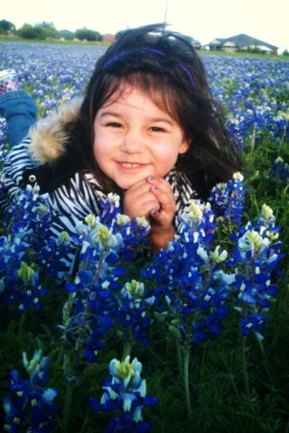 Grandaughter in a field of Bluebonnets,Priceless!!