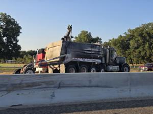 Interstate Shutdown: Gravel truck rolls over on I-35