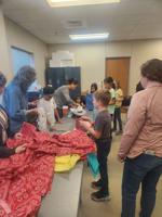 Bags not books as kids learn to sew at the library