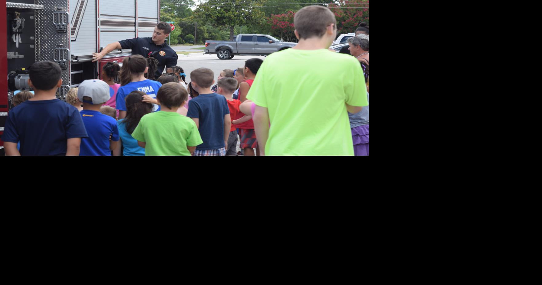 Fire safety seminar at library offers hands-on experience to children ...