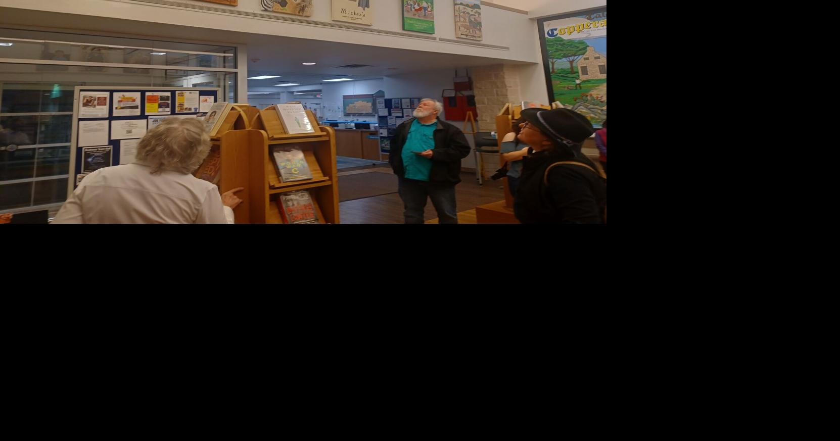 Local artists reveal art reflecting Cove history displayed at library