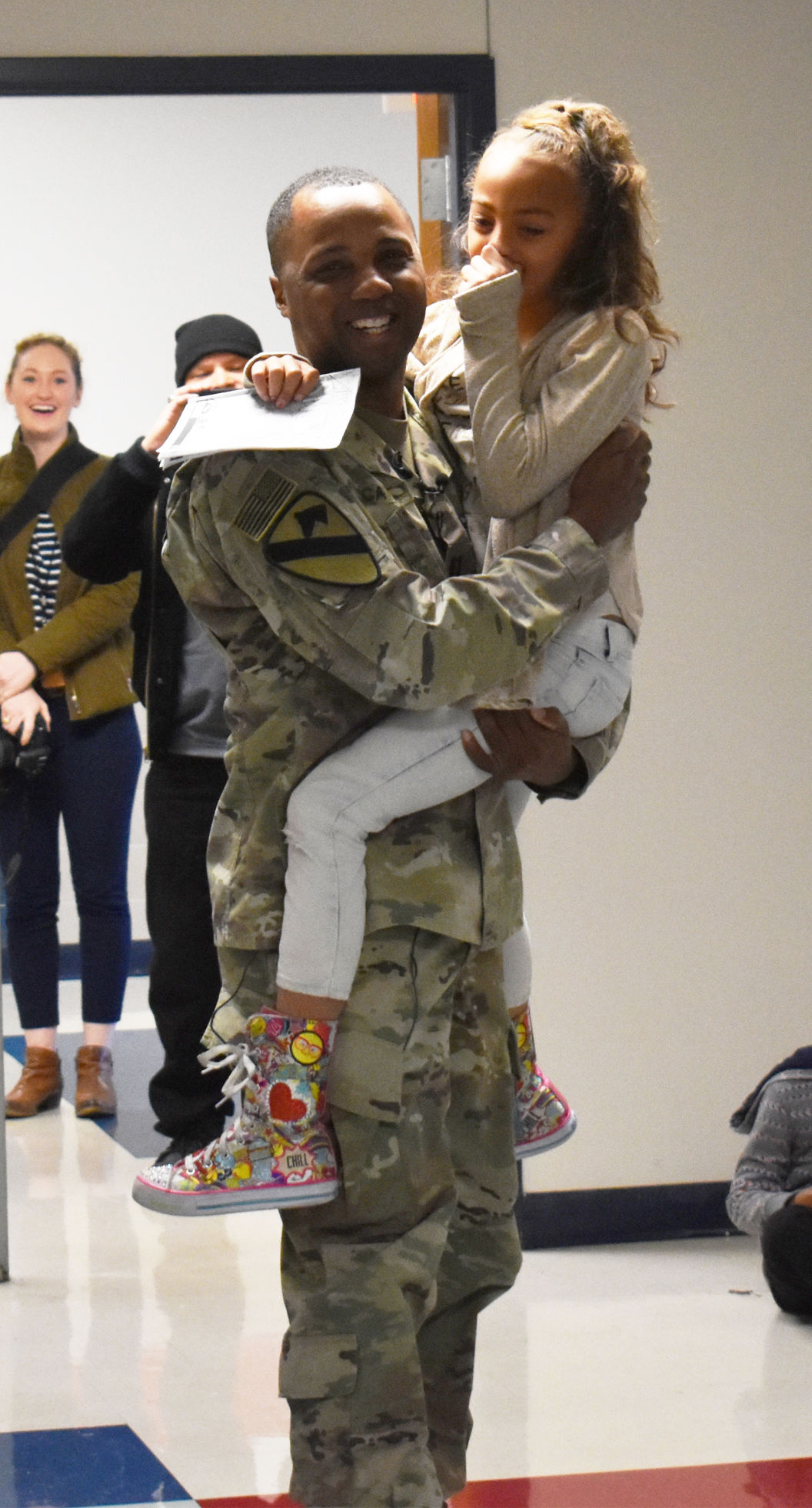 Soldier surprises daughter at Killeen school with early return from deployment Military