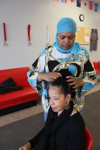 Stylist teaches women how to manage naturally curly hair | News |  