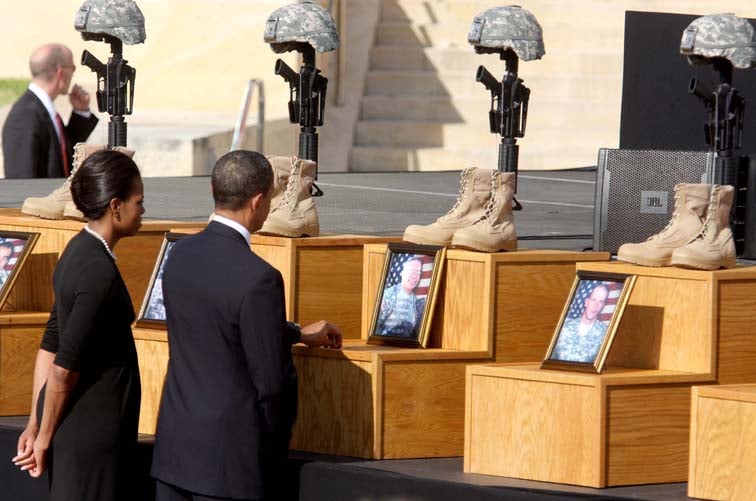 President Obama and First Lady pay respect