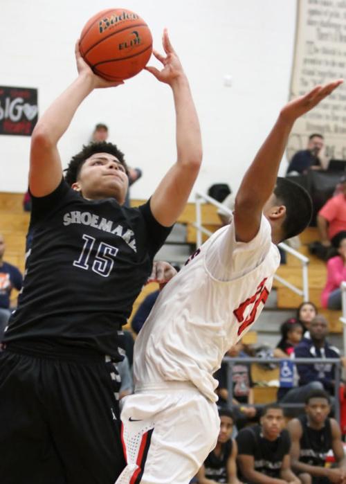 Shoemaker holds off Heights in OT 52-47