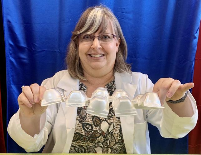 Science Time program build egg carton model to explore the spine