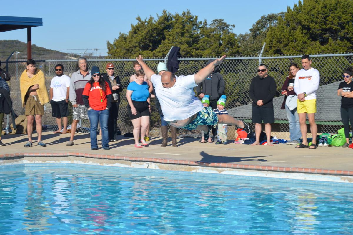 In freezing weather, Cove residents take the Polar Bear ...