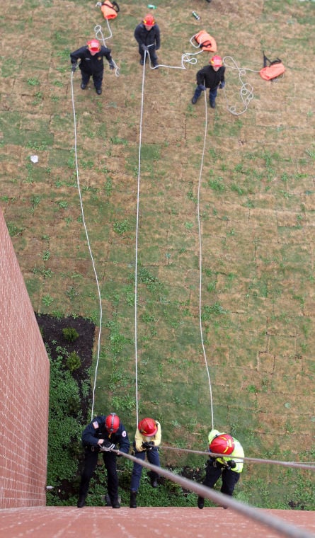 Firefighters Rappelling