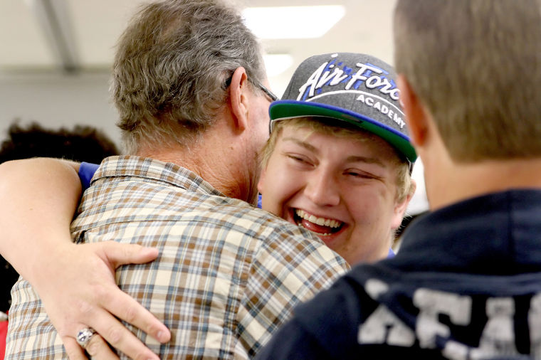 Greene among eight Cove signees