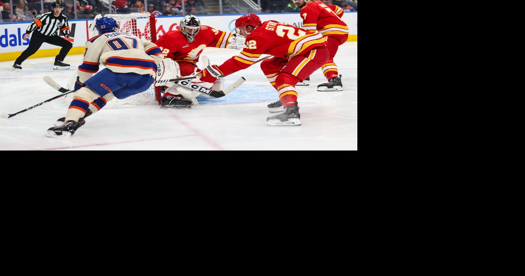 Jarry makes 24 saves in the Oilers' 4-0 victory over the Flames ...