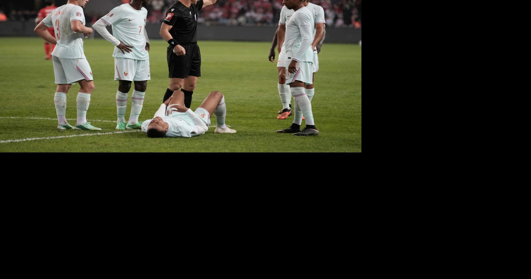 Mbappé exits with knee injury after netting a goal for France against Turkey, set to depart the team.