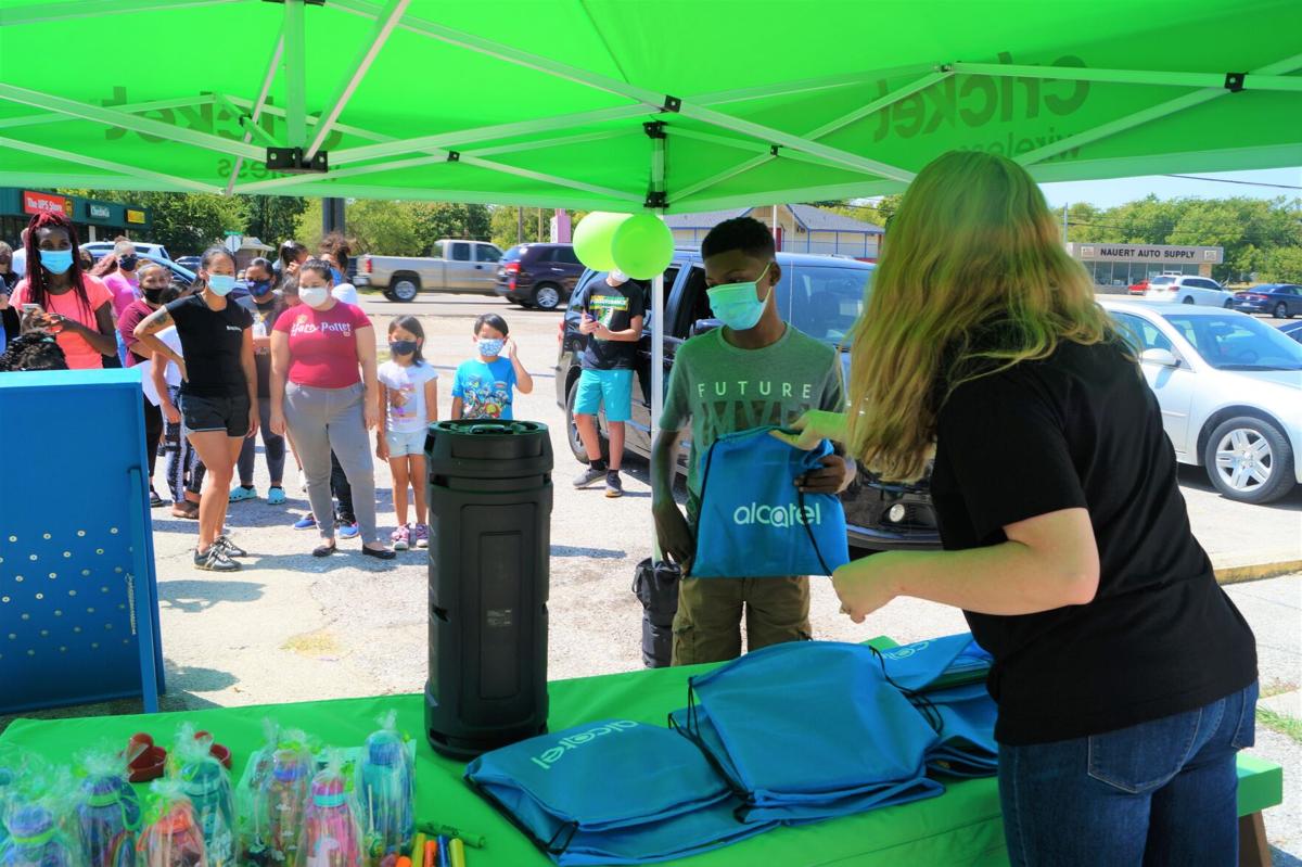 Cricket Wireless employees team up for backtoschool backpack giveaway Copperas Cove Herald