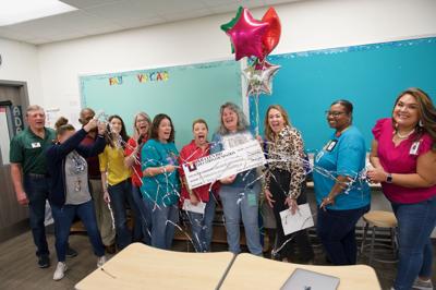 KISD teachers surprised with additional funding for educational ...