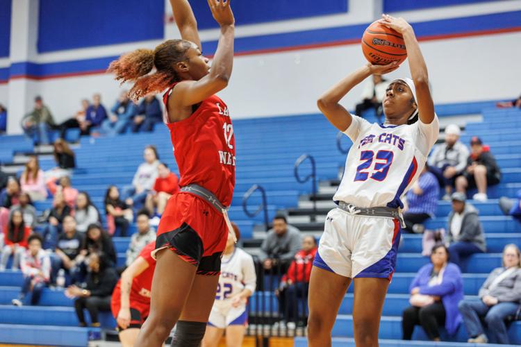 126A GIRLS BASKETBALL Jennings helps Heights girls pull away in 2nd