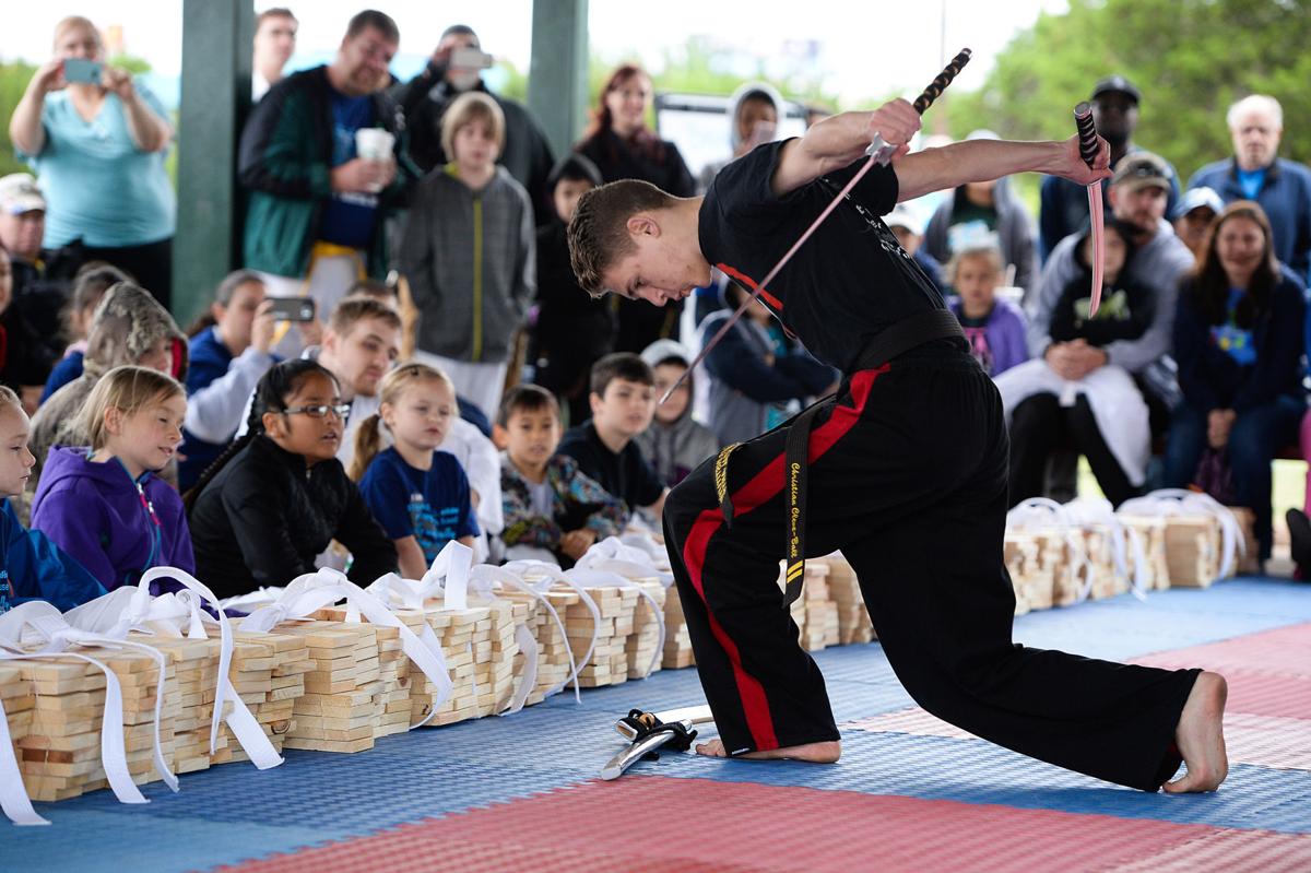 Heights martial arts school raises 5K for autism at