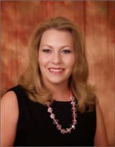 Cove Chamber official surrenders to police