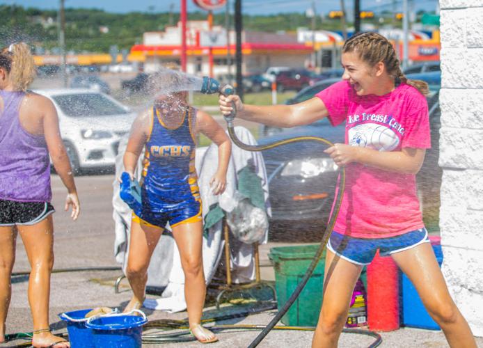 Cchs Cheerleaders Wash Cars To Raise Funds For Booster Club Community