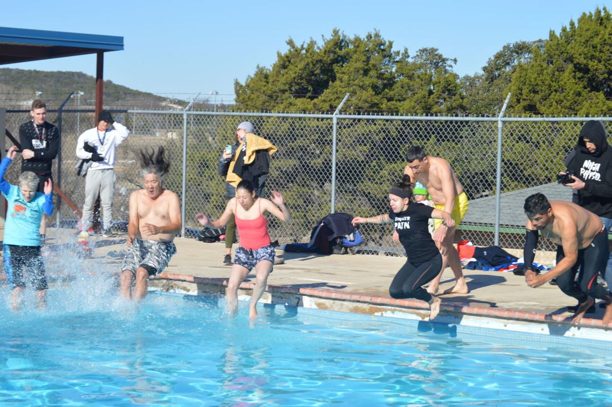 In freezing weather, Cove residents take the Polar Bear ...