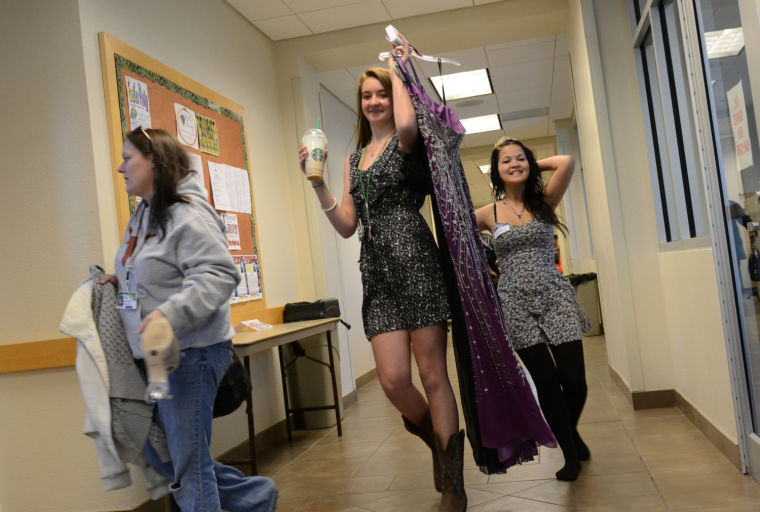 High school girls  shop   for prom  dresses  at Junior 