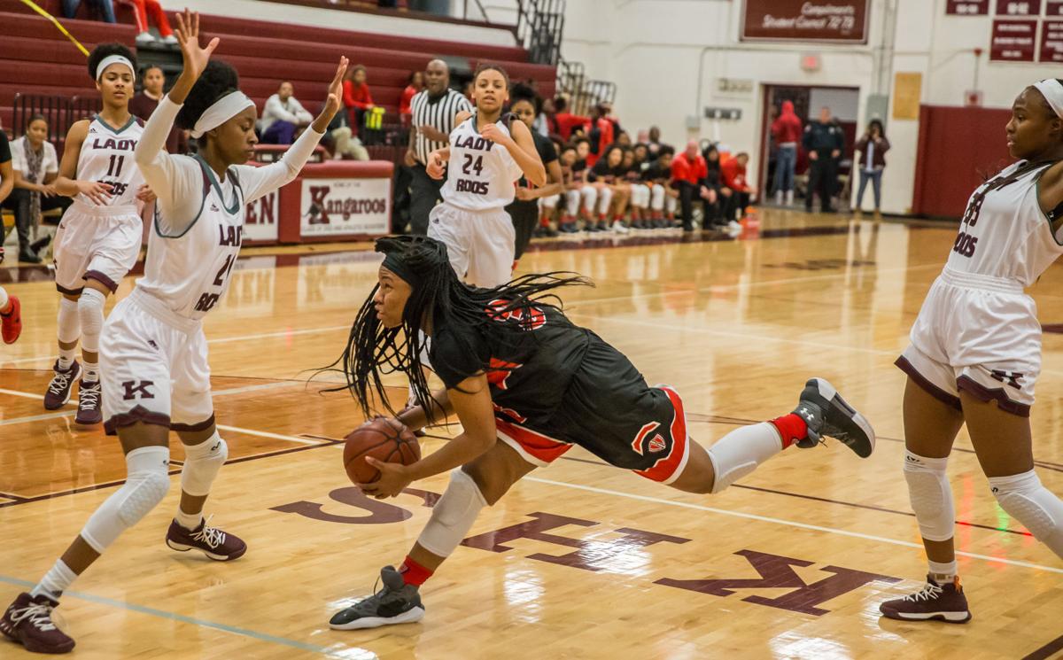 GIRLS BASKETBALL Upshaw’s big 2nd half helps Lady Roos down Heights in