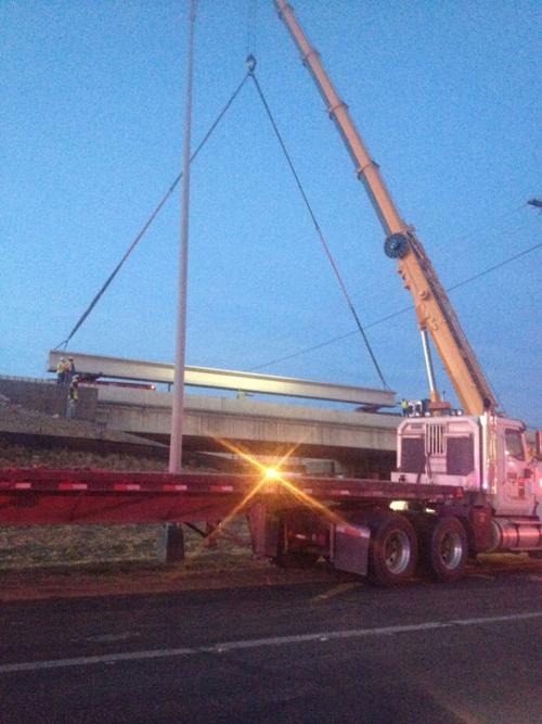 Overpass beam placed on U.S. 190