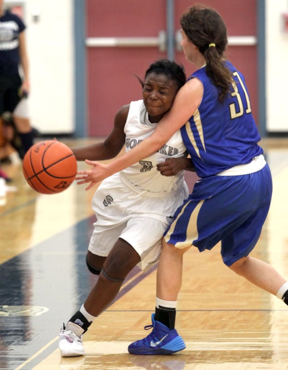 Basketball: Lady Wolves’ offense can’t match defense in loss to