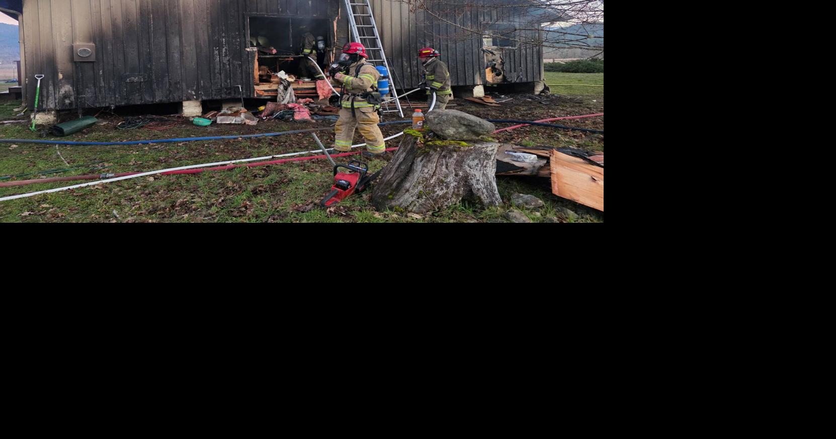 Firefighters battle Holland Loop Drive blaze in Cave Junction | Local ...