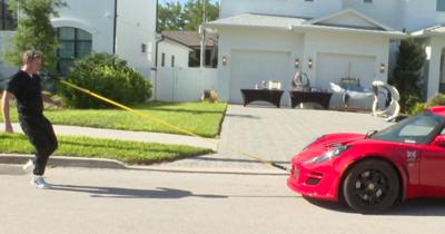 Tampa dentist goes for record pulling car with teeth