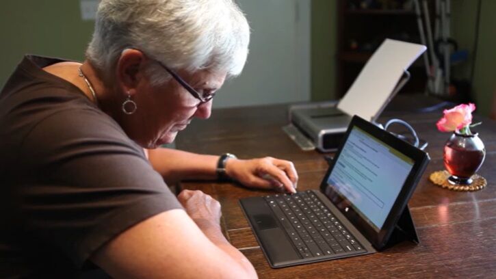 Disability Rights Oregon blind voter using tablet, August 2024.jpg
