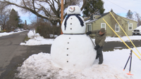 Former Sculptor Builds 8-Foot Snowman to Bring Positivity to Community Amid Snowstorm