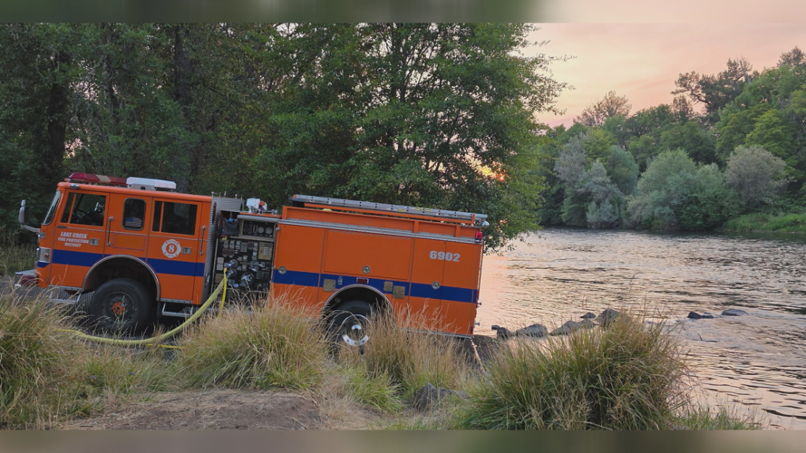 Lake Creek VFD's type one engine being used to fill other apparatuses