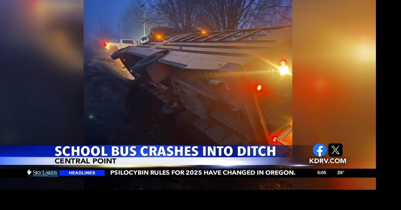 Student taken to hospital after school bus slides off road | Video ...