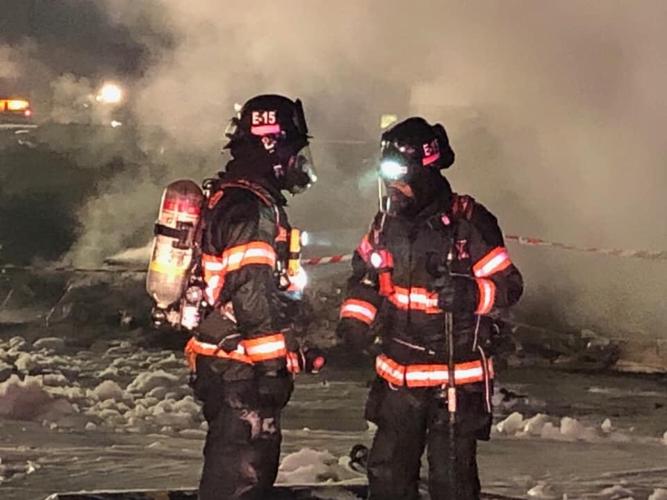 Federal investigators begin hauling away debris from deadly Medford plane crash