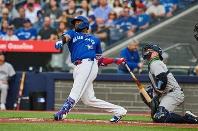 Blue Jays continue ascent, top Yankees to tie for top spot in American League East