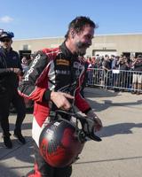 Keanu Reeves spins out at Indianapolis Motor Speedway in pro auto racing debut
