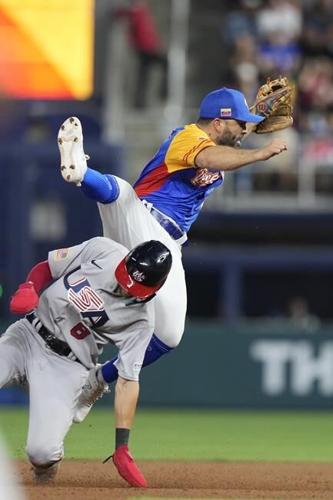 Astros' Altuve leaves WBC game after hit on hand by a pitch