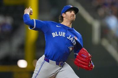 Gausman pitches 8 innings and Varsho homers as Blue Jays beat Rangers 2-1