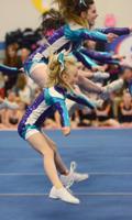 Leaping cheerleaders
