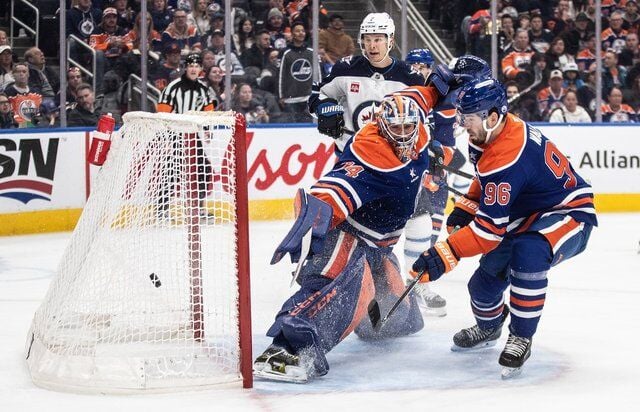 Connor's OT winner lifts Jets past Oilers, who lost McDavid late