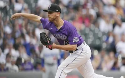 Kuhl tosses 3-hit shutout, Rockies beat Dodgers 4-0 at Coors