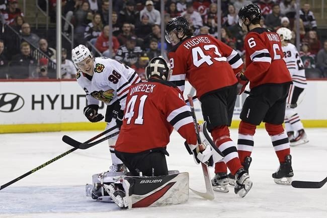 Connor Bedard departs after big hit as Chicago Blackhawks lose 4-2 to New  Jersey Devils, National Sports