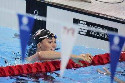 Canada's McIntosh wins second gold at world swimming championships