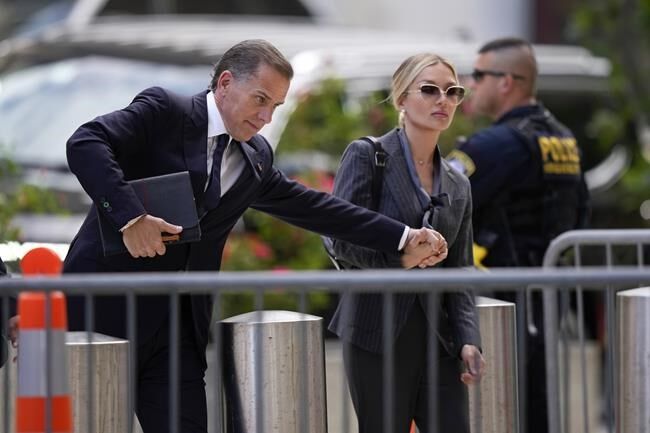 Hunter Biden and first lady Jill Biden arrive for jury selection in his federal gun case