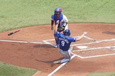 Royals catch fire with five-run 10th inning to push past Blue Jays 7-4
