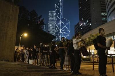 Hong Kong man arrested after paying tribute to queen